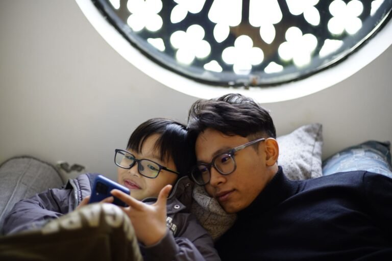 A bright lifestyle photo depicting build stronger family bonds through weekly digital free nights.